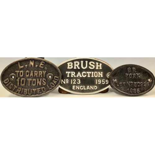 403 - Railwayana - an L.N.E. cast iron oval wagon plate; another, BR York, 1985; a cast aluminium wagon pl... 