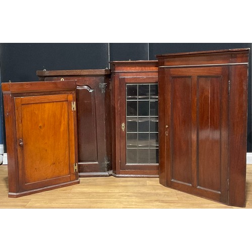 120A - A George III oak corner cupboard, raised and fielded panel door, 99cm high; others (4)