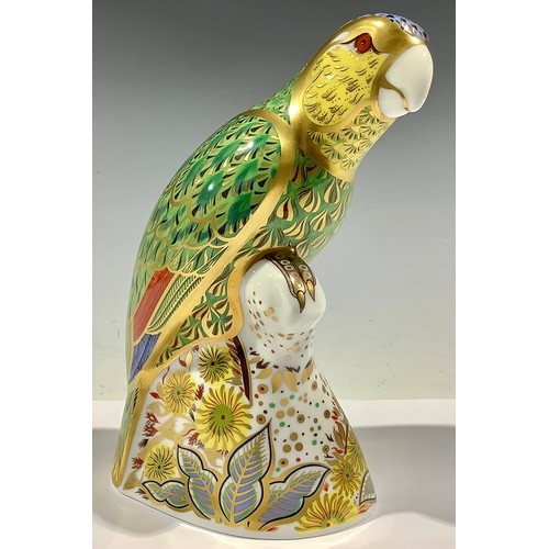 23 - A Royal Crown Derby paperweight, Amazon Green Parrott, limited edition 368/2,500, gold stopper