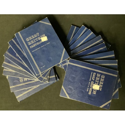 450 - UK twentieth century coins – fourteen collectors’ pre-printed blue card folders 15 x 19mm average co... 