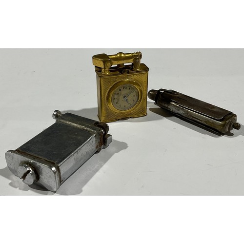 504 - A Vintage lighter inset watch; two others