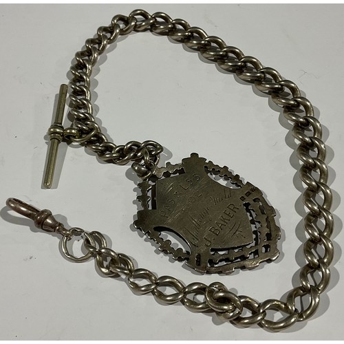 505 - A graduated link hallmarked silver Albert, with large fob, PAS and LSS Challenge shield, J Baker