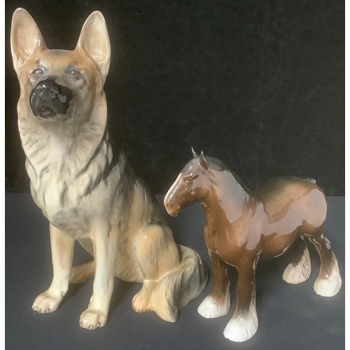 555 - A Beswick Alsatian fireside model number 410, 34cm high; a Beswick shire horse gloss model (2)