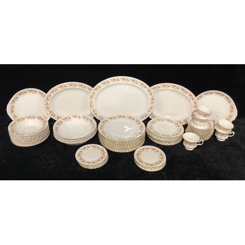 562 - A Royal Kent part dinner and tea service comprosing serving platters, cake plates, dinner plates, si... 