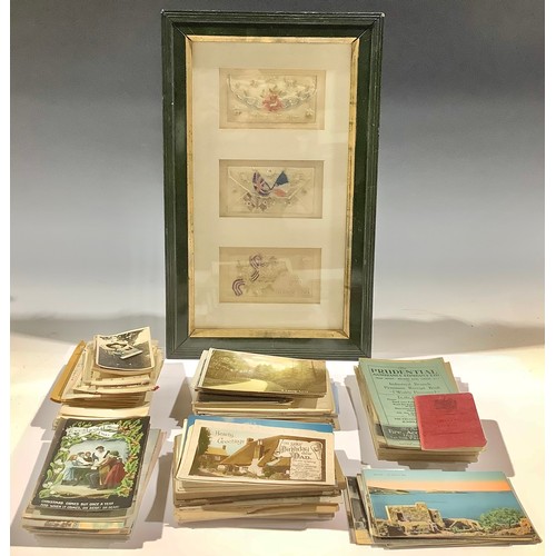 563 - A collection of postcards and framed WWI silks