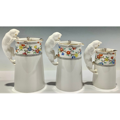 155A - A graduating set of three Spode Copeland's China milk jugs, the handles modelled as cats, each with ... 