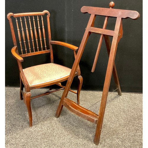 81 - A Victorian mahogany easel, 97cm high x 52.5cm wide;  an Edwardian armchair, (2).