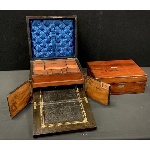 82 - A 19th century compendium walnut vanity box; including jewelry compartment followed by sliding writi... 