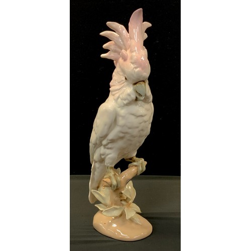 84 - A Royal Dux 20th century Czechoslovakian porcelain figurine in the form of a cockatoo parrot, hand p... 