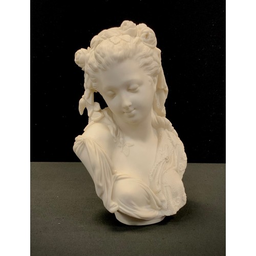 86 - A 19th century Parian ware bust of lady with roses in her hair, 20cm high.