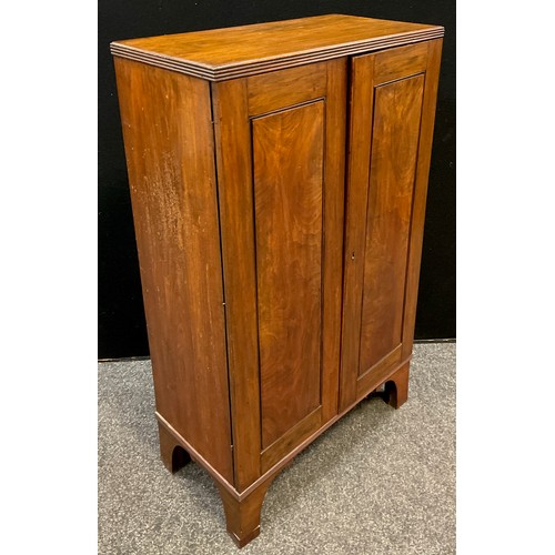 90 - A Victorian mahogany hall cupboard, pair of doors enclosing three tiers of shelving, bracket feet, 1... 