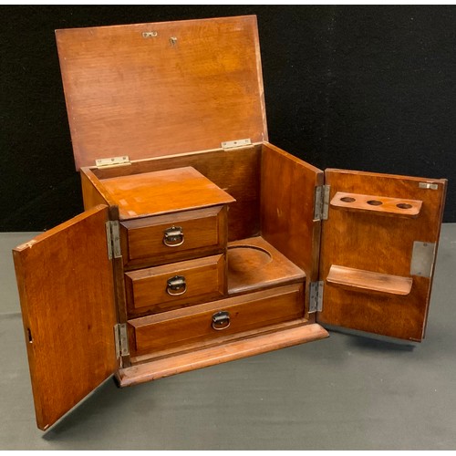 91 - A 20th century wooden, metal-bound, smokers cabinet, 28cm x 30cm