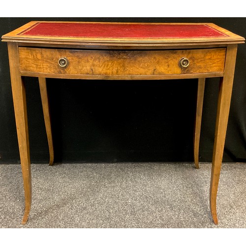 110 - A George III style Burr Walnut veneered hall table, bow front, inset red faux-leather writing surfac... 