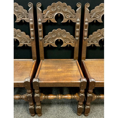 113 - A set of four Frank Pratt of Derby, 17th century style, carved oak dining chairs, shaped cresting ra... 