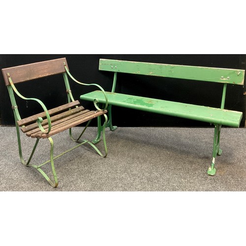 120 - Garden Furniture - an early 20th century cast iron railway platform-type bench, pine plank seat and ... 