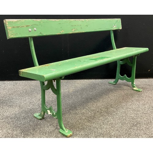 120 - Garden Furniture - an early 20th century cast iron railway platform-type bench, pine plank seat and ... 