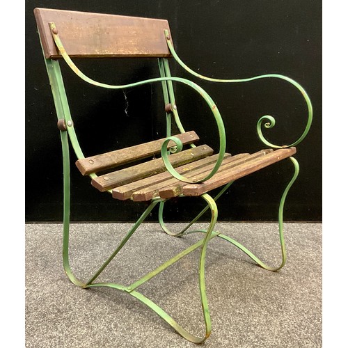 120 - Garden Furniture - an early 20th century cast iron railway platform-type bench, pine plank seat and ... 