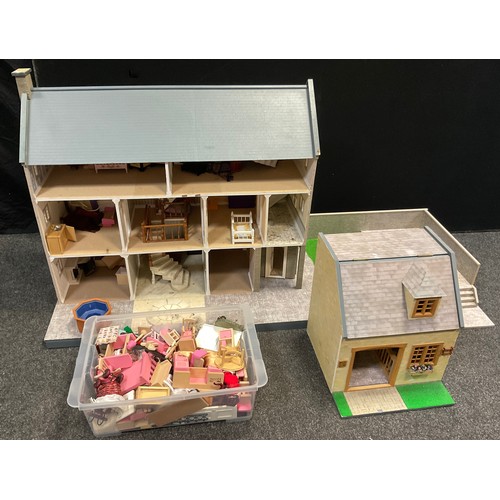 138 - A large ‘Country mansion’ Doll’s house, with annex, terrace garden and patio, and furniture, 91cm hi... 