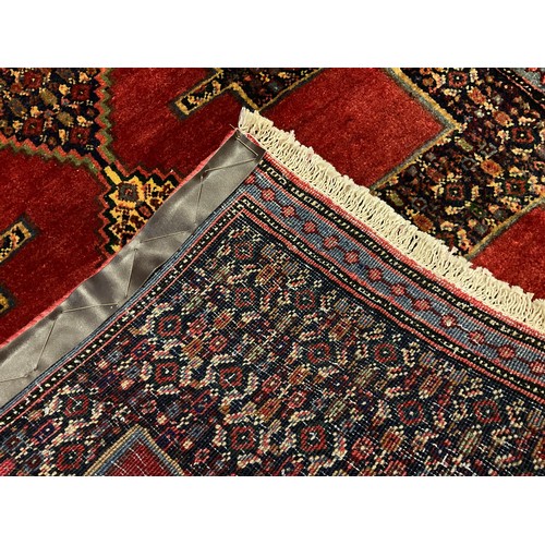 300 - A North West Persian Senneh runner carpet, 255cm x 78cm.