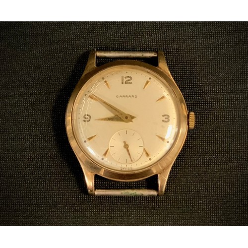 415 - A 1950s Garrard 9ct gold cased wristwatch head, 30mm diameter case, silvered dial, Arabic numeral an... 