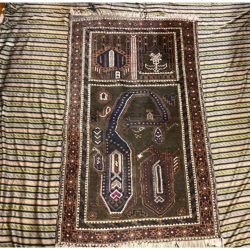 109 - A hand knotted Middle Eastern, possibly Afghan rug, 82cm x 142cm; other throw or drape (2)