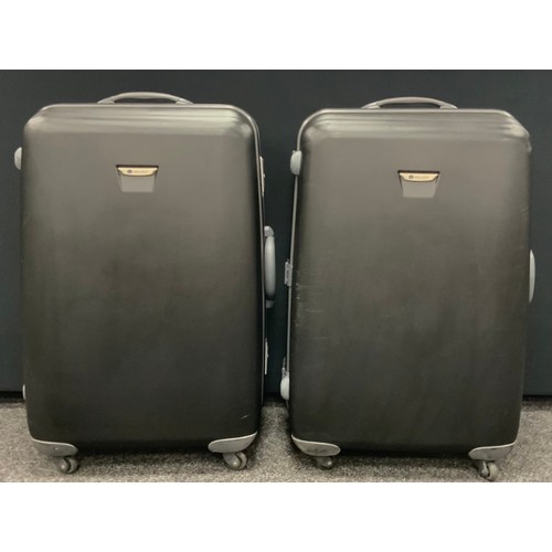 296 - Two large Delsey wheeled suitcases, 80cm x 50cm x 30cm, (2).