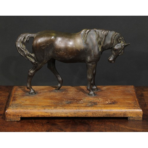 1643 - French School, 19th/early 20th century, a brown patinated bronze, of a horse, 27.5cm wide, associate... 