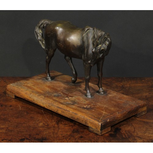 1643 - French School, 19th/early 20th century, a brown patinated bronze, of a horse, 27.5cm wide, associate... 