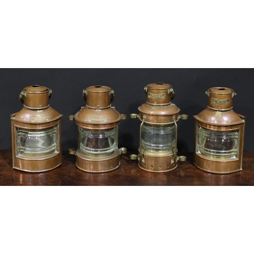 2162 - Interior Decoration - a composed suite of four of 19th century style copper and brass ship’s lamps, ... 