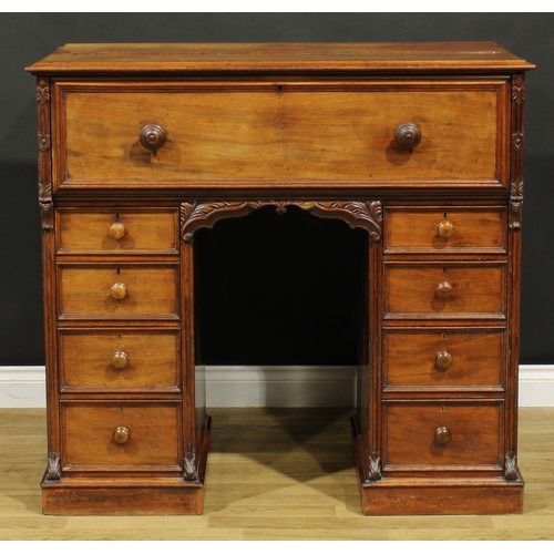 1481 - A Victorian mahogany secretaire kneehole desk, hinged top and fall front enclosing a tooled and gilt... 