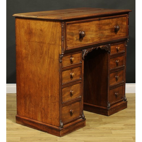 1481 - A Victorian mahogany secretaire kneehole desk, hinged top and fall front enclosing a tooled and gilt... 