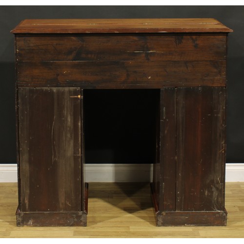 1481 - A Victorian mahogany secretaire kneehole desk, hinged top and fall front enclosing a tooled and gilt... 