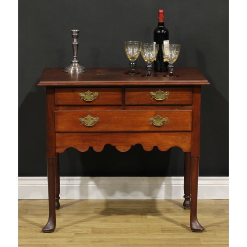 1283 - A 19th century American mahogany lowboy, rectangular top above two short and one long drawer, shaped... 