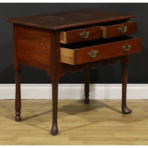 1283 - A 19th century American mahogany lowboy, rectangular top above two short and one long drawer, shaped... 