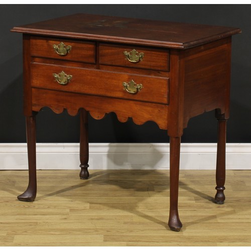 1283 - A 19th century American mahogany lowboy, rectangular top above two short and one long drawer, shaped... 