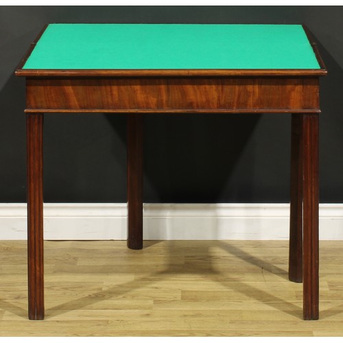 1303 - A George III mahogany card table, hinged top enclosing a baize lined playing surface, moulded intern... 