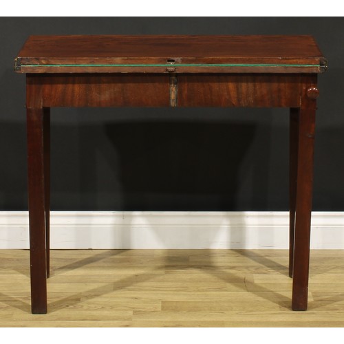 1303 - A George III mahogany card table, hinged top enclosing a baize lined playing surface, moulded intern... 