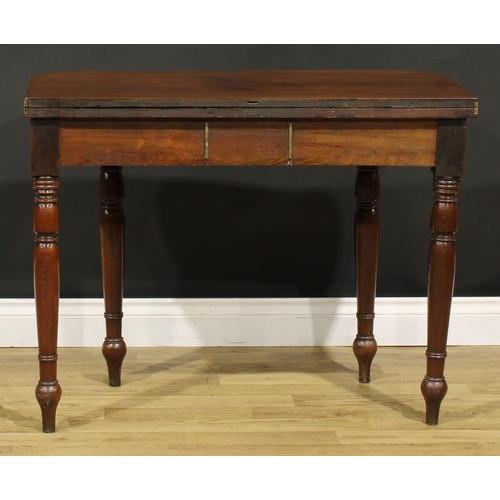 1252 - A 19th century mahogany tea table, hinged top with channelled edge above a frieze drawer, turned leg... 