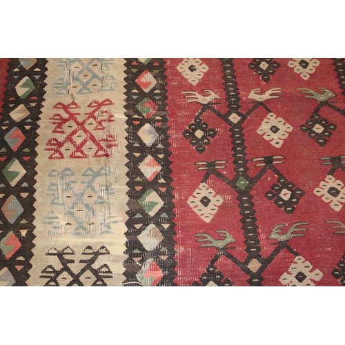 2112 - A Turkish Sarkoy Kilim rug or carpet, worked in the traditional manner, 339cm x 261cm