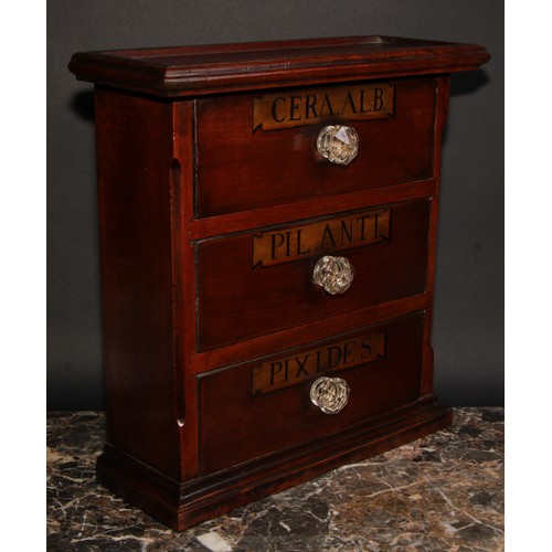 1849 - A mahogany table-top chest, as an apothecary cabinet, rectangular top above three drawers, glass han... 