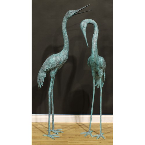 1520 - A pair of substantial contemporary verdigris patinated copper alloy garden models, as waterbirds, th... 