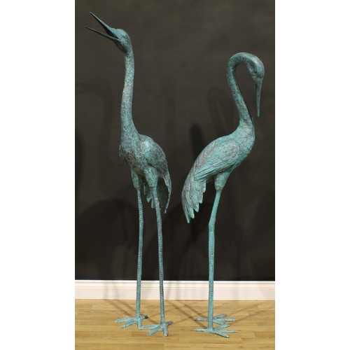 1520 - A pair of substantial contemporary verdigris patinated copper alloy garden models, as waterbirds, th... 