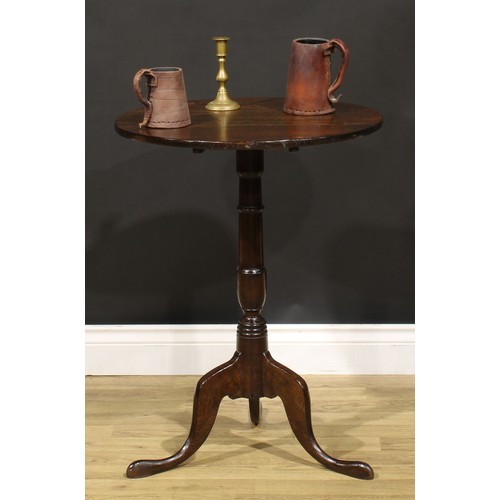 1537 - A George III oak tripod occasional table, circular tilting top, turned column, cabriole legs, pointe... 