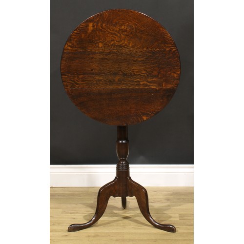 1537 - A George III oak tripod occasional table, circular tilting top, turned column, cabriole legs, pointe... 