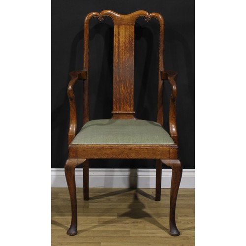 2104 - A pair of Arts & Crafts period vernacular oak George I design elbow chairs, each with a shaped crest... 