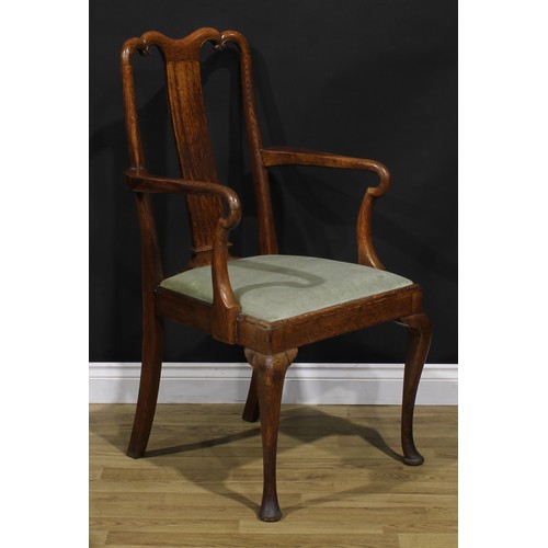 2104 - A pair of Arts & Crafts period vernacular oak George I design elbow chairs, each with a shaped crest... 