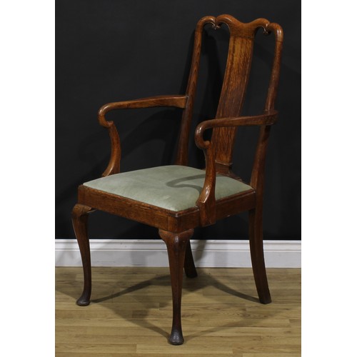 2104 - A pair of Arts & Crafts period vernacular oak George I design elbow chairs, each with a shaped crest... 