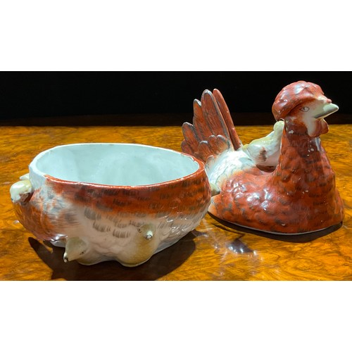 116 - A 19th century Staffordshire pottery dish and cover, modelled as a hen and chicks, the plumage in ru... 