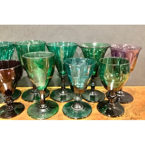 285 - A 19th century emerald green coloured drinking glass, faceted trumpet shaped bowl, knopped stem, dom... 