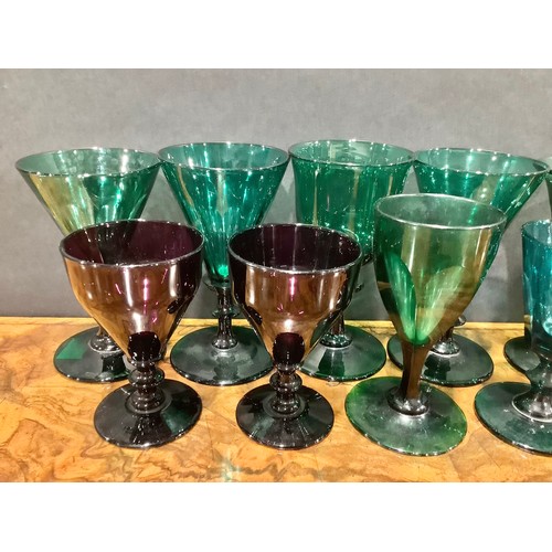 285 - A 19th century emerald green coloured drinking glass, faceted trumpet shaped bowl, knopped stem, dom... 